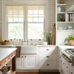 Lauren Liess Instagram - My favorite kitchens are timeless, hardworking, and comforting. I like it when a place takes you away and makes it easy to create in. This classic white kitchen is a forever favorite with simple shaker cabinets and subway tile an island built out of reclaimed oak 🤍 from my book #feelslikehome | designed by @laurenliessandco | renovation by @carrmichaelconstruction | photos by @helennorman * We a very similar shaker style with slight modifications in my new cabinetry collection with @uniquekitchensandbaths