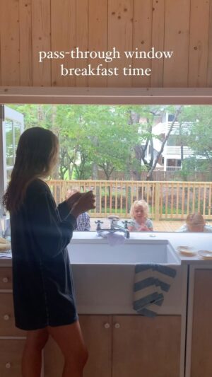 Lauren Liess Instagram - One of my favorite things at @thelostcottage is the big ol’ pass-through window and bar in the kitchen. This place is tiny but we packed every square inch with function   fun. CANNOT WAIT for my new book (BEACH LIFE) to come out so I can finally share it all with you!!! {and the cottage is officially in the market today!! Here we go onto the next chapter 🤍🌊}
