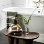 Lauren Liess Instagram - Crisp clean bathroom makeover {swipe to the end for the before where you can see we had a closet -with a window in it!- removed to make room for the tub and to get more natural light in the bathroom} I love fixing floor plans and making things make sense in a house! 🤍 Happy Friday and heads up- most of our LL&Co. apothecary shop is on S A L E up to 50% off right now!! | designed by us | renovation by @carrmichaelconstruction | photos by @helennorman