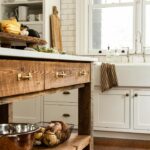 Lauren Liess Instagram - My favorite kitchens are timeless, hardworking, and comforting. I like it when a place takes you away and makes it easy to create in. This classic white kitchen is a forever favorite with simple shaker cabinets and subway tile an island built out of reclaimed oak 🤍 from my book #feelslikehome | designed by @laurenliessandco | renovation by @carrmichaelconstruction | photos by @helennorman * We a very similar shaker style with slight modifications in my new cabinetry collection with @uniquekitchensandbaths