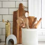 Lauren Liess Instagram - My favorite kitchens are timeless, hardworking, and comforting. I like it when a place takes you away and makes it easy to create in. This classic white kitchen is a forever favorite with simple shaker cabinets and subway tile an island built out of reclaimed oak 🤍 from my book #feelslikehome | designed by @laurenliessandco | renovation by @carrmichaelconstruction | photos by @helennorman * We a very similar shaker style with slight modifications in my new cabinetry collection with @uniquekitchensandbaths