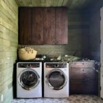 Lauren Liess Instagram - Sharing some of my favorite goods from my shop @laurenliessandco today in stories 🤍🌿 looooove our handmade laundry baskets and don’t mind so much when they’re hanging our full of clothes to fold 😉 most of my favorite shop good are beautiful, functional items since the reality is that our interiors are full of the functional - it may as well look good! 🤍🌿 This the laundry room from our #wisconsinfarmhouseproject. Our client painted the old boards with green milk paint and the cabinets are the “primitive” from my collection with @uniquekitchensandbaths | photo by @helennorman