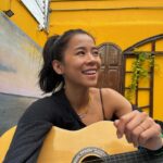 Leah Lewis Instagram - One minute you’re plucking on a guitar, 12 hours later… a hot new food poisoning has entered the villa The Amazon rainforest is right next door and I’m reporting live from the depths of my bed and eternal gut jail but I will make it there by the end of the week mark my words 🌿❤️🇧🇷