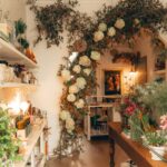 Leanne Ford Instagram - As many of you know when we moved back to our little town right outside of Pittsburgh I told anyone who wants to open (or update!) a business around here that I would love to help because I want to do my part to see our town flourish and grow. My friend, Anne who owns @fox.andthefleur, was the very first one to take me up on the offer for her flower shop! Together we transformed this 450 sq/ft shop located right on the main street of our little town. The flowers needed to be the star of the show so we made sure to keep things simple everywhere else. We freshened everything up with a coat of white paint, added an oversized sink for cutting stems, installed some shelves and peg rail that we painted the same color as the walls, swapped out lights, brought in some vintage furniture pieces I had hanging around and filled the place from floor to ceiling (literally) with flowers! You can read more about Anne and her shop in Volume 5 of @feelfree magazine — link in bio to snag a copy! // #LeanneFordInteriors shot by @sarahbarlow