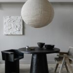 Leanne Ford Instagram - This was the first time we installed a project and had our LF x @buckmason shop open and ready to go with all of our favorite things just sitting there at our fingertips. For the first time, we were able to take things right out of the shop and literally walk them down the street to their forever home. For this project we took pieces from my core collection with @crateandbarrel and paired them with vintage finds and trinkets — creating a space that feels layered and curated but still clean and minimal. I love how all of my core pieces look different in every space. Wherever they end up they seem to take on a life of their own! Also if you see anything you love just give us a holler — everything you see is available to you! You can reach the shop at 412.356.5919. //#LeanneFordInteriors shot by @erinashkelly and styled @_mon_modern______