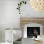 Leanne Ford Instagram - Even a skinny mantle gets “decorated” around here! Thanks to @ckmunny the artist! I salvaged this stunning stone fireplace from my personal house (we took the wall down) to my project house. Was so honored and happy to have @michaelablaney dream up @eatmics here for #Sewickley! Have you eaten there yet? Yum. // #LeanneFordInteriors shot by @erinashkelly with @hilaryrobertson for @feelfree magazine Vol 1!