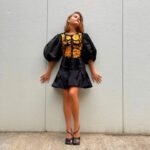 Lia McHugh Instagram - Content X2 ~ The day I saw my action figure for the first time💛 • • • Stylist: @laura_sophie_cox Makeup: @makeupby_danielle Hair: @erintaylorhair Outfit: @patou @awake_mode Jewelry: @misho_designs @beladorajewelry