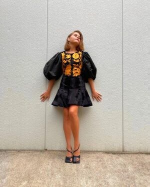 Lia McHugh Instagram - Content X2 ~ The day I saw my action figure for the first time💛
•
•
•
Stylist: @laura_sophie_cox 
Makeup: @makeupby_danielle 
Hair: @erintaylorhair 
Outfit: @patou
@awake_mode 
Jewelry: @misho_designs
@beladorajewelry