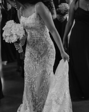 Liana Ramirez Instagram - more… 

photographer: @frannypullenphotography 

•
•
•

wedding planner: @wolferandco / @thejamiewolfer 
florals: @fiftyflowers 
suits: @generationtux 
dresses: @sherrihill 
DJ: @atlastentertaintment 
venue: @canyonwoodridge 
Videographer: @justinruizmedia 
cake: @raynedesserts 
hair & makeup: @sammiezavala @heyhaleybray @makeupartistveronica 
champagne flutes: @elenahonch 
food: @tuscanoitalian 
staffing: @ambianceeventstaffing 
rentals: premiereeventstx