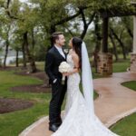 Liana Ramirez Instagram – 04.06.23. 

WE ARE MARRIED!!!!! 

photographer: @frannypullenphotography 

•
•
•

wedding planner: @wolferandco / @thejamiewolfer 
florals: @fiftyflowers 
suits: @generationtux 
dresses: @sherrihill 
DJ: @atlastentertaintment 
venue: @canyonwoodridge 
Videographer: @justinruizmedia 
cake: @raynedesserts 
hair & makeup: @sammiezavala @heyhaleybray @makeupartistveronica 
champagne flutes: @elenahonch 
food: @tuscanoitalian 
staffing: @ambianceeventstaffing 
rentals: @premiereeventstx