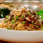Lidia Bastianich Instagram - Spaghetti Caruso. This easy and simply delicious pasta is named for the famous Italian opera singer, Enrico Caruso, who created it. It is made with San Marzano tomatoes, mushrooms, peas, onions, and an addition of chicken liver. Always a family favorite, It makes ME want to sing! And I share the secret of choosing the correct pasta shape and cooking it perfectly every time. Link to recipe and video in my bio. Buon Gusto! . . . . . #LidiasRecipes #LidiasItaly #LidiasKitchen #LidiaBastianich #ItalianFood #25YearsofLidia #FromLidiasTableToYours #centofinefoods @centofinefoods #LidiasSoundtrack