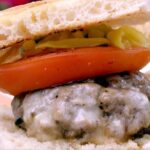 Lidia Bastianich Instagram - Everybody loves a good burger, and I am no different, but here I bring the hamburger a bit closer to Italy. Warming the tomatoes for a minute or two brings out their juices and eliminates the need for condiments. I like grating vegetables, like the onion in the recipe, into my burger mixture - it adds flavor and moisture. Try this with beef burgers, as I do here, but it’s an even better tip for turkey or chicken burgers, which tend to be dry. Link to video in my bio. Buon Appetito! #LidiasRecipes #LidiasItaly #LidiasKitchen #LidiaBastianich #ItalianFood #25YearsofLidia #FromLidiasTableToYours