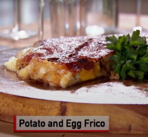 Lidia Bastianich Instagram - Potato and Egg Frico – a crispy Asiago cheese crust made with potatoes and eggs is always a winner at the brunch table.  From the Friuli region in Italy, frico is a traditional dish in which potatoes and cheese are baked together. My rendition makes a hearty breakfast or, served topped with salad, a great lunch. Cut in slices, it can be passed around at a cocktail party. It is a favorite breakfast dish when I have my family visiting. There is always room at the family brunch table for a Bellini bar, so I will share my ideas for that as well. Link to video in my bio. 
.
.
…
l#25yearsoflidia #LidiasItaly #LidiasKitchen  #LidiaBastianich #ItalianFood #25YearsofLidia