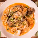 Lidia Bastianich Instagram - Clam & Scallion Risotto. Linguine with clams is an Italian classic and a favorite dish of mine. However, I love a good risotto with clams and scallions too. I know that cooking the risotto can seem a bit intimidating at first - but here I will show you the simple steps to follow to make a perfectly delicious risotto every time. Buon Gusto! Link to video in my bio. #LidiasRecipes #LidiasItaly #LidiasKitchen #LidiaBastianich #ItalianFood #25YearsofLidia #FromLidiasTableToYours