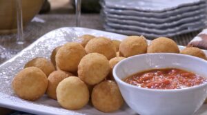 Lidia Bastianich Instagram - Rice Balls Stuffed with Sausage Ragu.  This is one of my favorite pass-around party dishes, as often as not the plate doesn’t make it far into the room before it’s emptied.  This recipe makes a small amount of ragù to go inside the rice balls, but double the recipe to make a larger batch and save some to use as a pasta sauce.  Buon Appetito!  Link to video and recipe in my bio, #LidiasRecipes #LidiasItaly #LidiasKitchen  #LidiaBastianich #ItalianFood #25YearsofLidia @centofinefoods #cento