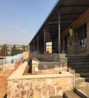 Lily Newmark Instagram - Hi everyone - you may not know this, but after a trip to Rwanda in 2007 to work on a social action project, my family were so moved by what we saw we decided to start a charity @apartnerineducation and build a primary school in Kigali. There’s a short film to give you an idea of what our school is like in the link in donation page in my bio! 
Everyone involved - parents, students, staff and the local community -  like it so much they have asked us to build a secondary school next door, so we’ve made a start! 
We have been building three new classrooms and a hall for sport, music, art, drama and somewhere to eat lunch. 
We are at a critical moment - the building work on the classrooms needs to be finished by August so that the inspectors can give us a thumbs up and our P6 students can start secondary school. Each classroom costs £20,000 to build, and I am setting this as my target to raise. 
You can help me support our school by giving here (link in bio). If every one of you just gave ONE pound/dollar/euro then we’d reach our goal - bringing high quality, affordable education to every child in Rwanda. 
Thank you so much,
Lily