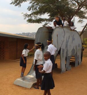 Lily Newmark Instagram - Hi everyone - you may not know this, but after a trip to Rwanda in 2007 to work on a social action project, my family were so moved by what we saw we decided to start a charity @apartnerineducation and build a primary school in Kigali. There’s a short film to give you an idea of what our school is like in the link in donation page in my bio! 
Everyone involved - parents, students, staff and the local community -  like it so much they have asked us to build a secondary school next door, so we’ve made a start! 
We have been building three new classrooms and a hall for sport, music, art, drama and somewhere to eat lunch. 
We are at a critical moment - the building work on the classrooms needs to be finished by August so that the inspectors can give us a thumbs up and our P6 students can start secondary school. Each classroom costs £20,000 to build, and I am setting this as my target to raise. 
You can help me support our school by giving here (link in bio). If every one of you just gave ONE pound/dollar/euro then we’d reach our goal - bringing high quality, affordable education to every child in Rwanda. 
Thank you so much,
Lily