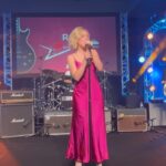 Lily Brooks O'Briant Instagram - The Rahm Night 3 ✨ Had the most amazing time performing my original song ‘Wait a Minute’ with the incredible band @sixwire at @rahmcelebritygolftournament! It was an incredible weekend raising money for the children @stjude ❤️ thank you so much @kevinprahm for being the best TV dad! I love you so much! • Thank you so much @aliceandolivia for the incredible dress I wore on the carpet! It was as absolutely perfect! 🤍 • • #singer #stjude #stjudeschildrensresearchhospital #stjudewontstop #therahm #charity #actress #golftournament #event #singersongwriter