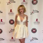 Lily Brooks O'Briant Instagram - The Rahm Night 3 ✨ Had the most amazing time performing my original song ‘Wait a Minute’ with the incredible band @sixwire at @rahmcelebritygolftournament! It was an incredible weekend raising money for the children @stjude ❤️ thank you so much @kevinprahm for being the best TV dad! I love you so much! • Thank you so much @aliceandolivia for the incredible dress I wore on the carpet! It was as absolutely perfect! 🤍 • • #singer #stjude #stjudeschildrensresearchhospital #stjudewontstop #therahm #charity #actress #golftournament #event #singersongwriter