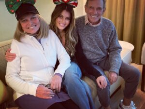 Lindsay Hartley Instagram - 1 year and 1/2 ago, my mom was diagnosed with stage 4 colon cancer. She has been spending every other week getting treatment at City of Hope in Duarte. This was taken last Christmas at the hotel on their property. My daughter thought it would be fun to all wear light up headbands for the early light show we were all going to see that night. My mom was too tired so we just lit up our headbands and had our own light show. 🥳⭐️🎄❤️ her cancer has spread to a membrane under her lung and just over a week ago, COH said there is nothing more they can do for her. My dad is searching for other places to find treatment right now. 🙏My mom is an inspiration, a fighter, and so strong. I am grateful for her and her time. I am also grateful for my dad who relentlessly pushes forward and encourages my mom constantly to live and not give up. And as for Isabella…well, she is my everything. 
Happy Mother’s Day to all mothers out there. We see you and we love you!