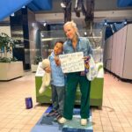 Lindsay Czarniak Instagram - Can you tell which airport we were flying into? One of our faves for sure. Love a life size T. Rex! Our resident paleontologist never gets tired of this #JOTD #jokes #laugh #dinosaurs #airport