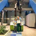 Lindsay Czarniak Instagram - Can you tell which airport we were flying into? One of our faves for sure. Love a life size T. Rex! Our resident paleontologist never gets tired of this #JOTD #jokes #laugh #dinosaurs #airport