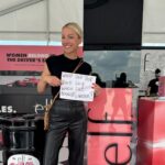 Lindsay Czarniak Instagram - This one really made me laugh out loud. I love when makeup and racing intersect! And thanks @katherineracing for being a good sport during the 4 hour rain delay. (Swipe for bonus answer pic bc I love a checkered flag:) #JOTD #indycar #makeup #lipstick #duck #racing #girlsinsports #girlpower