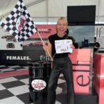 Lindsay Czarniak Instagram - This one really made me laugh out loud. I love when makeup and racing intersect! And thanks @katherineracing for being a good sport during the 4 hour rain delay. (Swipe for bonus answer pic bc I love a checkered flag:) #JOTD #indycar #makeup #lipstick #duck #racing #girlsinsports #girlpower