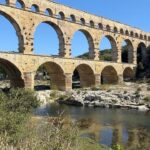 Lisa-Marie Koroll Instagram – Road tripping 🐬
1. First tapas stop in Peñiscola 
2. Inhaling the french country air 
3. and 4. visiting the pope palace in Avignon and 5. marvel at the mysterious art of #EvaJospin 
6. wandering the streets of Avignon 7. Dipping into the Gardon under the Pont du Gard 
8. and 9. Jumping into the Mediterranean Sea and 10. Enjoying Henry’s holiday face