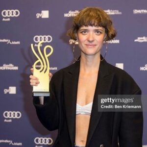 Liv Lisa Fries Instagram - @deutscherschauspielpreis 💥🙏 thank you so much for the award and the evening !  For the 4th season of Babylon Berlin for my beloved Charlotte Ritter 🔻🔺 @driesvannoten styled by @kamilla_richter 🩵 make up by @claudia_rotoli 🧡
