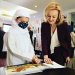 Liz Truss Instagram - Reading The Highway Rat with children at the Afghanistan evacuee centre in Doha. #Qatar