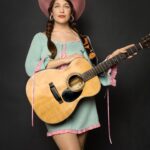 Lola Kirke Instagram - Houston! We’ve only got about a MONTH until our show on April 23 with @dalehollowmusic, so we’re giving away a couple pairs of tickets!! ❤️ To enter, text HOUSTON to 1 (469) 481-3885 or sign up at the link in my bio! Ps how sick is this custom @izaakopatz strap?? 📸 @sumnerdilworth