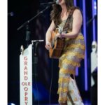 Lola Kirke Instagram - Still can’t believe I got to celebrate the release of my new EP “Country Curious” by doing this… what’s your favorite track so far?! 👢 @frauleinboots 💋 @bheadabe Dress #junecarter   📸: © Grand Ole Opry, photos by Chris Hollo