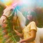 Lola Kirke Instagram - Sneak peek of the cover of my upcoming EP, Country Curious for those who are indeed country curious 😘 It’s coming out NEXT WEEK on Feb 16! Raise your hand if you’re as excited as I am 🙋🏻‍♀️ Pre-save the album now at the link in my bio!! 🤠 📸 @mamahotdog 💋 @morganlindsaybeauty 🐎 @colbysarmyinc