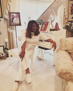 Loretta Devine Instagram - With the holidays quickly approaching, I always appreciate having comfy and festive shoes to slip into around the house! These limited edition Traveltime clogs featuring Swarovski crystals from @EasySpiritOfficial are adding a little bit of sparkle to my holiday season!  They're also 25% off on easyspirit.com with my exclusive code LORETTA25.  They make the perfect gift (or you could just treat yourself like I did)! #easyspiritofficial #easyspirit #partner