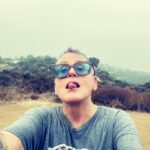 Lori Petty Instagram - - 6:30 AM hike…the ocean is out there somewhere…love y’all so much and can we talk about oxygen and trees!?! 😂🌳🌺💙 #swipe