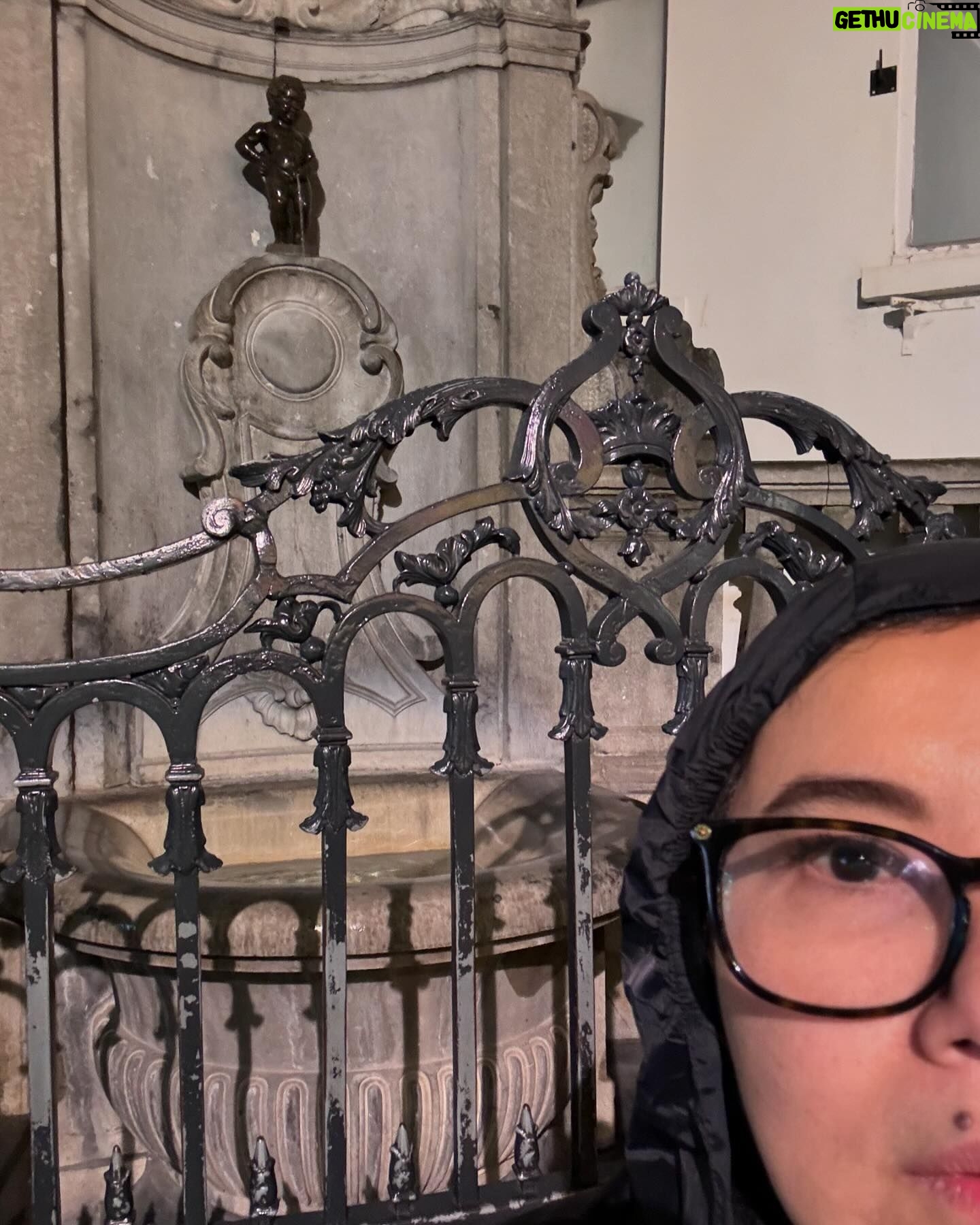 Lorna Tolentino Instagram - It is a small bronze statue that measures 50 cm and represents a small naked boy urinating into a fountain’s basin. It is located in the old part of town, between rue de L’Étuve and rue Chene, next to the Grand Place.