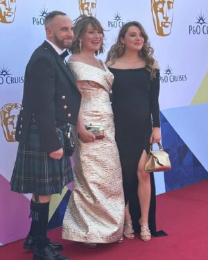 Lorraine Kelly Instagram - I love this pic so much !!!
My beautiful daughter @rosiekellysmith looking blooming and my gorgeous friend @markheyesstylist at the @bafta TV awards Thanks to @sassiholford for my STUNNING dress #happy #family #friends #love #celebration