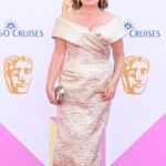 Lorraine Kelly Instagram – Thank you @bafta! Dress @sassiholford, styling @bella_hignett_styling, shoes @esskashoes, clutch @tylerellisofficial, earrings @mimibaldwinjewellery, hair and make up @helenhandmakeup 
@p&obafta @gettyentertainment @pandocruises