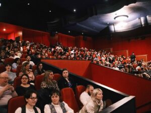 Louisa Connolly-Burnham Instagram - It’s been one whole week since the @sisterwivesfilm premiere & we’re finally floating back to down earth. Thank you to the 550  legends that came & supported us in a sold out @genesiscinema & to all the wonderful humans that made this film possible. We can’t wait to see where this journey takes us next 🩷👭✨

(sound on in the last clip for the audiences reaction as the credits started to roll 🥹) 

📸 @georgeontheboat 

#SISTERWIVES