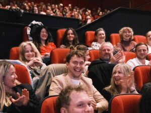 Louisa Connolly-Burnham Instagram - It’s been one whole week since the @sisterwivesfilm premiere & we’re finally floating back to down earth. Thank you to the 550  legends that came & supported us in a sold out @genesiscinema & to all the wonderful humans that made this film possible. We can’t wait to see where this journey takes us next 🩷👭✨

(sound on in the last clip for the audiences reaction as the credits started to roll 🥹) 

📸 @georgeontheboat 

#SISTERWIVES