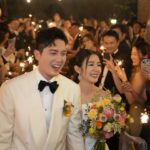 Louisa Mak Instagram – 唔少朋友都問我，哇搞三場婚禮，咪好辛苦！的確係，完事後直情要瞓足成個禮拜先recover到。其實唔係因為想搞到好「盛」大，而係源自於一個儘量make everyone happy嘅初心。

由於我和盛生好怕衝突、唔開心，所以我哋好早就決定將婚禮分幾次搞，而每一場都有各自嘅主角。大大小小嘅選擇就因住主角嘅需求而決定。

第一場盆菜宴，主角係老爺奶奶。我地盡跟圍村傳統，賓客絕大部份都係佢哋嘅親戚和朋友，而表演嘉賓方面，就邀請了奶奶很喜愛嘅李龍基先生。

第二場係正常擺酒，主角就係麥生麥太，菜式、流程、程序等都以佢地嘅意見為首。圍數全部歸佢地兩老，只受場地所限而唔使同對家協調😌 婚紗款色都迎合佢地喜好

至於第三場，就係更瘋狂嘅party，主角終於係我同盛生喇✌️因為之前已經take care 咗雙方父母嘅要求，呢次我哋就可以盡情選擇自己鍾意嘅嘢 – 戶外草地、樂隊歌曲、西式食物、無限酒精🫢… 爸爸媽媽雖然唔識欣賞，但係都好盡力去嘗試投入 😂 

呢個安排，幫我地避免咗唔少衝突。男女家唔使爭圍數、長輩和後輩唔使爭論食物和形式係中式定西式；頭兩場我和盛生安分守己地做好兒子和女兒的本分，再於尾場玩得好盡興🥳（盡興到啲相都唔出得街🤪)。咁壞處就係… 真係好攰🫠。

每人屋企都唔一樣，家家有本難念的經，以上純粹share下我倆嘅經驗。總括來講，我爸爸媽媽、老爺奶奶也是非常隨和，我們非常幸運，而最後似乎各人都開心。不過同時都提醒一句，家人話「冇咩所謂，簡簡單單就OK」呢句說話… ummm.. 千祈唔好盡信呀🤪唔知你哋又有冇啲咩婚禮後嘅insight呢？喺comment share吓吖！

最後，多謝 @agnesb_cafefleuriste 為三場婚宴都提供無限量超好食蛋糕😌 無論喺中式定西式婚宴、男家定女家、長輩定小朋友，蛋糕都一樣咁受歡迎😍

#勁甜麥

photo 1, 2, 5, 8 @taptsov_photography 
photo 4 @orbsproductionwedding 
photo 6, 7, 9, 10 @stein_image