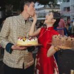 Louisa Mak Instagram - 唔少朋友都問我，哇搞三場婚禮，咪好辛苦！的確係，完事後直情要瞓足成個禮拜先recover到。其實唔係因為想搞到好「盛」大，而係源自於一個儘量make everyone happy嘅初心。 由於我和盛生好怕衝突、唔開心，所以我哋好早就決定將婚禮分幾次搞，而每一場都有各自嘅主角。大大小小嘅選擇就因住主角嘅需求而決定。 第一場盆菜宴，主角係老爺奶奶。我地盡跟圍村傳統，賓客絕大部份都係佢哋嘅親戚和朋友，而表演嘉賓方面，就邀請了奶奶很喜愛嘅李龍基先生。 第二場係正常擺酒，主角就係麥生麥太，菜式、流程、程序等都以佢地嘅意見為首。圍數全部歸佢地兩老，只受場地所限而唔使同對家協調😌 婚紗款色都迎合佢地喜好 至於第三場，就係更瘋狂嘅party，主角終於係我同盛生喇✌️因為之前已經take care 咗雙方父母嘅要求，呢次我哋就可以盡情選擇自己鍾意嘅嘢 - 戶外草地、樂隊歌曲、西式食物、無限酒精🫢… 爸爸媽媽雖然唔識欣賞，但係都好盡力去嘗試投入 😂 呢個安排，幫我地避免咗唔少衝突。男女家唔使爭圍數、長輩和後輩唔使爭論食物和形式係中式定西式；頭兩場我和盛生安分守己地做好兒子和女兒的本分，再於尾場玩得好盡興🥳（盡興到啲相都唔出得街🤪)。咁壞處就係… 真係好攰🫠。 每人屋企都唔一樣，家家有本難念的經，以上純粹share下我倆嘅經驗。總括來講，我爸爸媽媽、老爺奶奶也是非常隨和，我們非常幸運，而最後似乎各人都開心。不過同時都提醒一句，家人話「冇咩所謂，簡簡單單就OK」呢句說話… ummm.. 千祈唔好盡信呀🤪唔知你哋又有冇啲咩婚禮後嘅insight呢？喺comment share吓吖！ 最後，多謝 @agnesb_cafefleuriste 為三場婚宴都提供無限量超好食蛋糕😌 無論喺中式定西式婚宴、男家定女家、長輩定小朋友，蛋糕都一樣咁受歡迎😍 #勁甜麥 photo 1, 2, 5, 8 @taptsov_photography photo 4 @orbsproductionwedding photo 6, 7, 9, 10 @stein_image