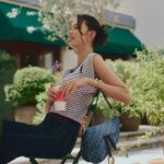Louise Wong Instagram – Just hanging out with my stylish Denim Oblique handbag by my side.☕️🩵🫧☁️

@Dior #DiorFall24