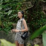 Louise Wong Instagram - Lost in the city, found in nature. 🦋 #DIORSS24 @dior