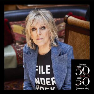 Lucinda Williams Instagram - Whew! 2023 has been a blast. We rang in my 70th birthday playing a show in Belfast and celebrated with a surprise party back in the states with my friends. 

@americanafest “pre-Grammy salute” (which I was so excited to tune in via livestream as I was under the weather… but an honor, nonetheless!)

My memoir was released in April and hit the NYT bestseller list 🥲

Stories From a Rock N Roll Heart came out this summer ❤️‍🔥 and I am overwhelmed with the outpouring of love it’s been receiving.

We toured with our new friends @bigthiefmusic and had a blast when we got to share the stage 

Forbes included me in their 50 over 50 😅

Played guitar on stage at @theryman for the first time since my stroke in 2020 🙌🎸

Car Wheels hit its 25th anniversary and we had a great time at the tribute at @thebasementeast

And this was the year we introduced our new concert formatting for “Don’t Tell Anybody the Secrets” tour, where we incorporate more storytelling and visuals along with the songs. 

All in all, 2023 was an exciting year full of rock n roll throughout Australia, Mexico, Europe (twice) and all around the United States adding up to 200 days on the road. Watch out, 2024… we’re coming for you 😉