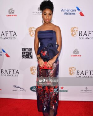 Lyric Ross Instagram - Earlier today at the BAFTA Tea Party !

Jumpsuit: @johnpaulataker 
Stylist: @mrenriquemelendez 
Seamstress: @auntfunkyscloset 
Makeup: @makeupbyhendra 
Hair: @hairbylucylomuro_
Clutch: @glomesh 
Jewelry: @flamboyant.jewelry