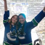 Madeleine Arthur Instagram - Madeleine Arthur and Lana Condor repping #Canucks blue in enemy territory! 🔵🟢⚪️
