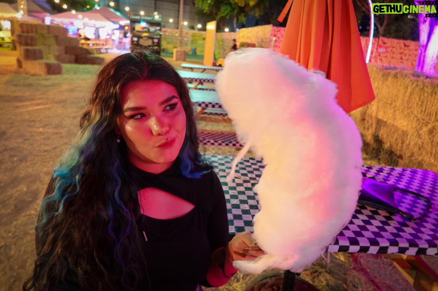 Madison De La Garza Instagram - here’s me eating cotton candy twice the size of my head :)