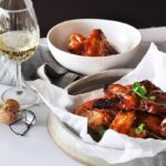 Maggie Beer Instagram - Whether you're gathered to watch a thrilling match in the Australian Open or test cricket, or simply enjoying the summer sunshine with friends, these indulgent Sticky Ginger and Chilli Chicken Wings are a delicacy your guests will love. View the recipe via the link in our bio. What's your favourite dish to serve amongst friends?